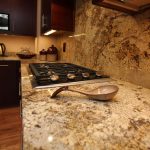 beige kitchen counters and backsplash